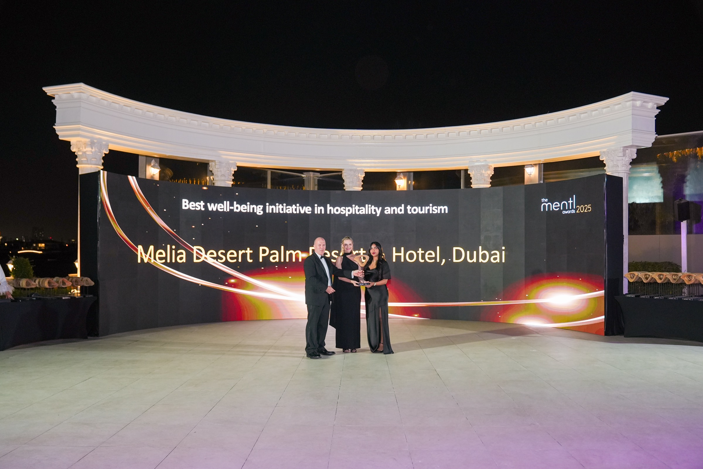 Meliá Desert Palm receiving its hospitality and tourism wellbeing award at the mentl awards 2025