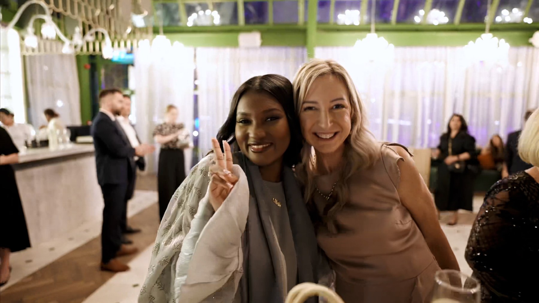 Two guests connecting at the mentl awards