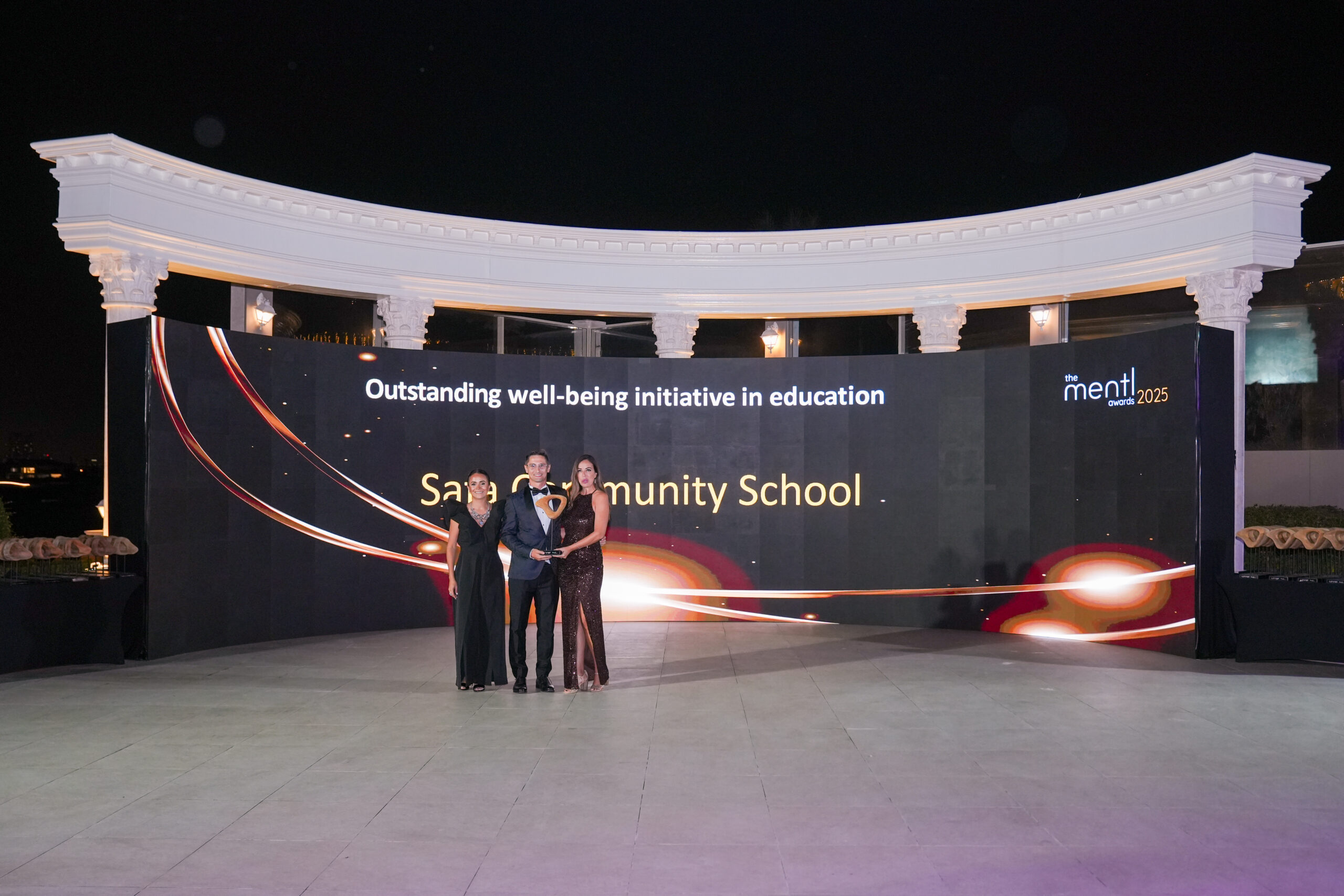 Safa Community School receiving its education award at the mentl awards 2025